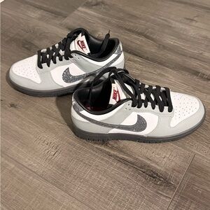 Nike Black and White Shoes with Red Accents